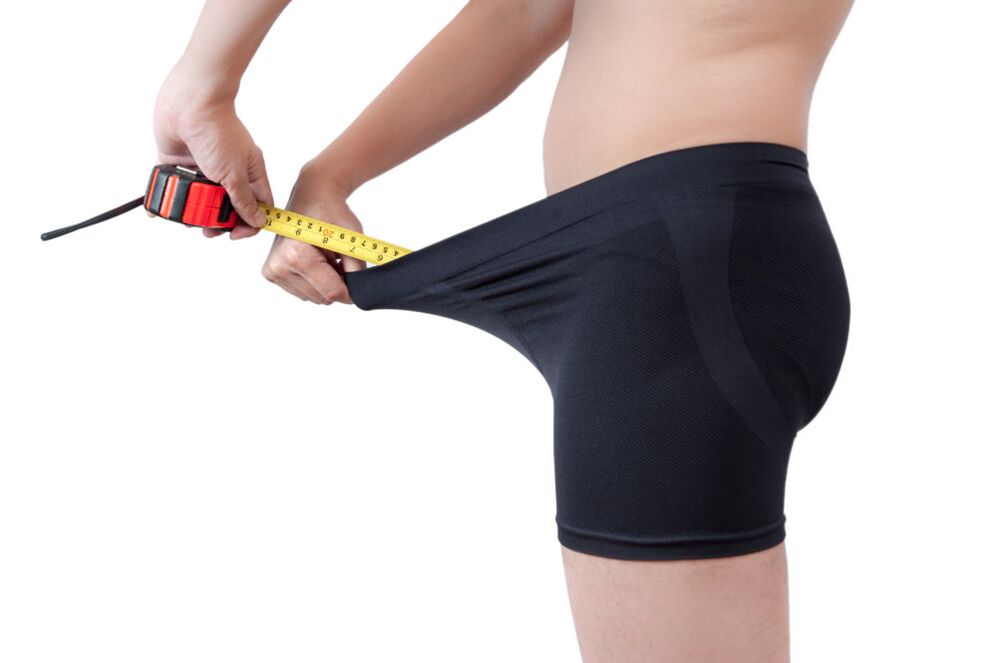 A man measures the results of penis enlargement
