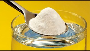 One teaspoon of baking soda is used in a cup of water to apply to the penis